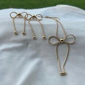 Elegant Gold Bow Necklace and Earring Set both are stainless steel